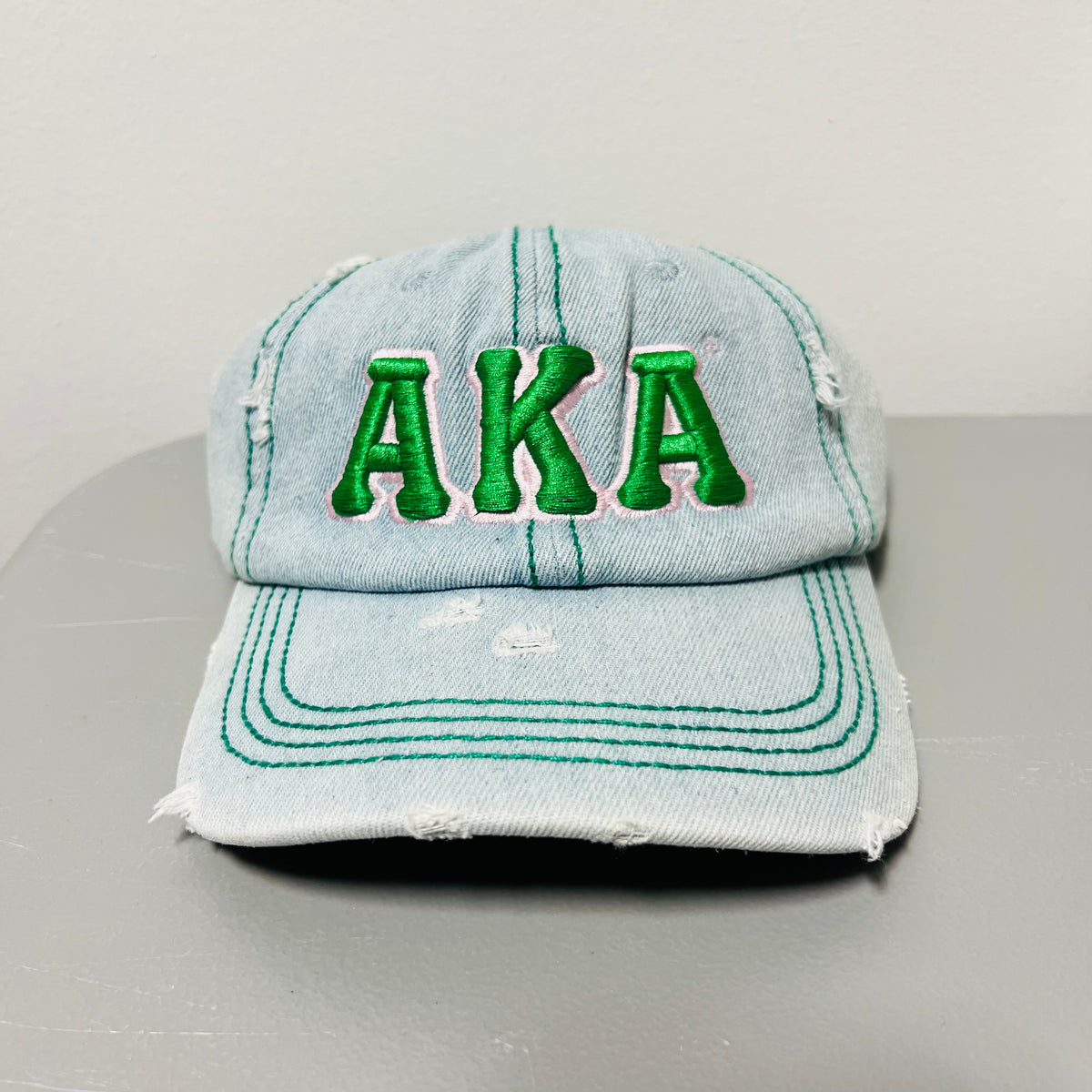 AKA Light Wash Denim w/green stitching Hat