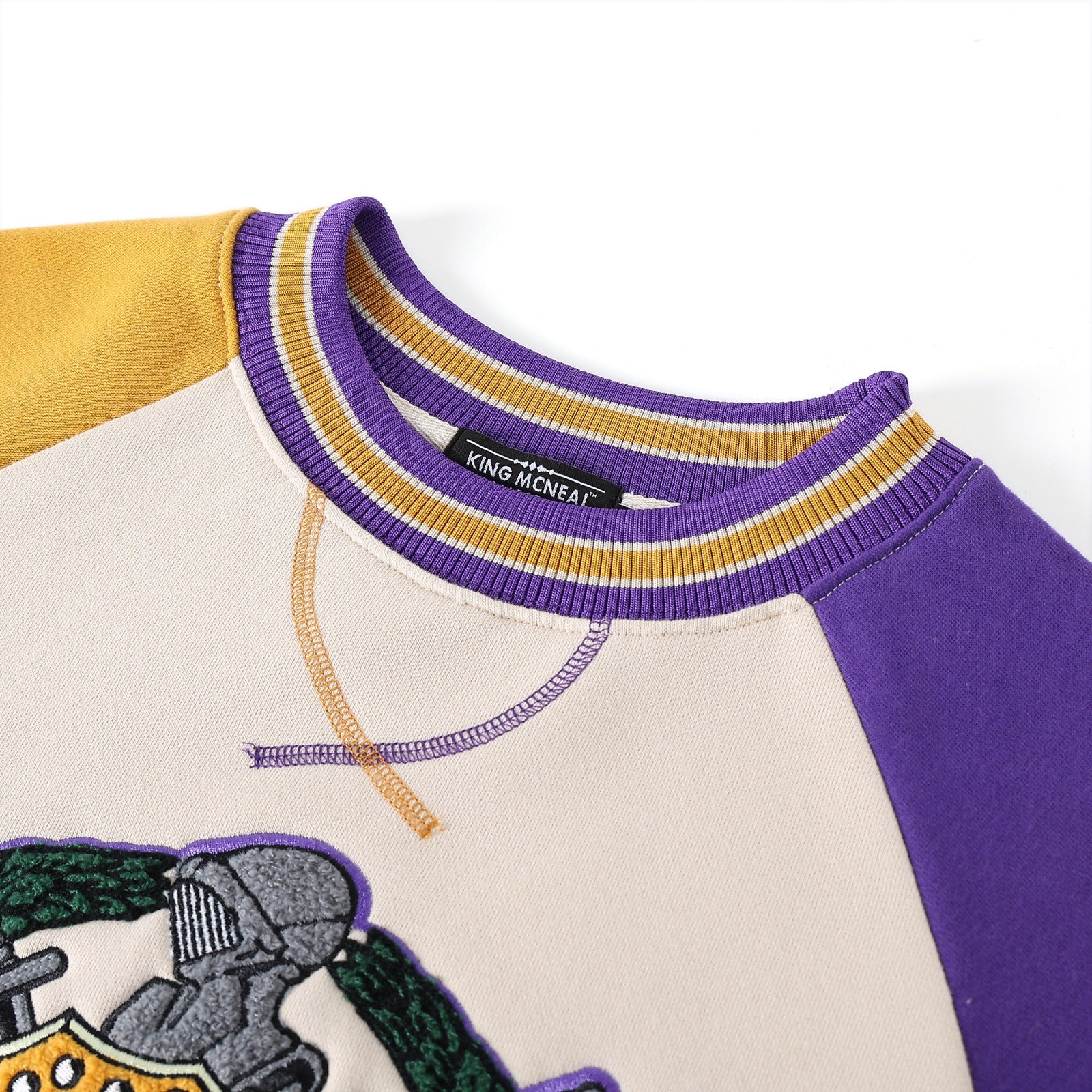 Omega Opposite Sleeve Crest Chenille Crewneck